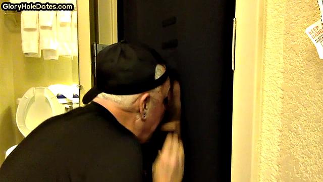 Gloryhole amateur DILF sucks penis at his home