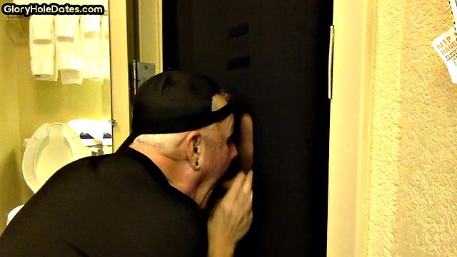 Gloryhole amateur DILF sucks penis at his home