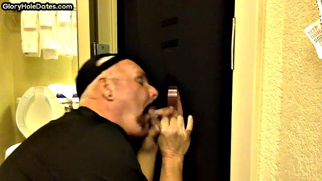Gloryhole amateur DILF sucks penis at his home