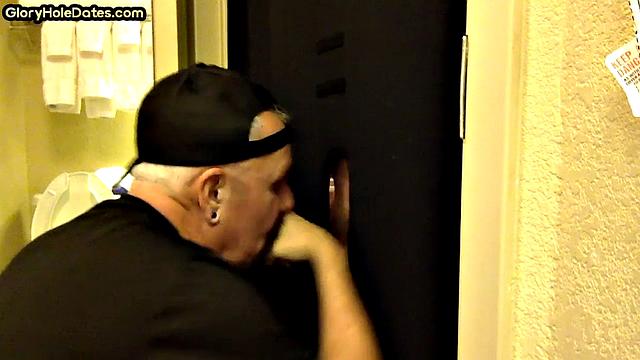 Gloryhole amateur DILF sucks penis at his home