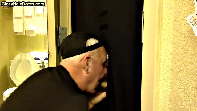 Gloryhole amateur DILF sucks penis at his home
