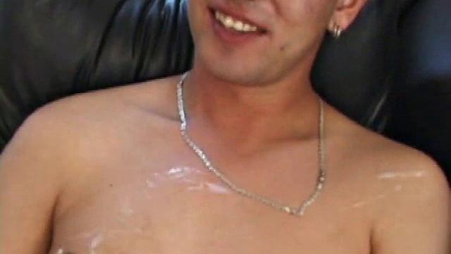 Christian and Richie sit on the sofa, watching a porn video while slowly rubbing their crotches. Richie shyly takes out his dick and watches as Christian strips off his shorts and exposes an impressive cock.