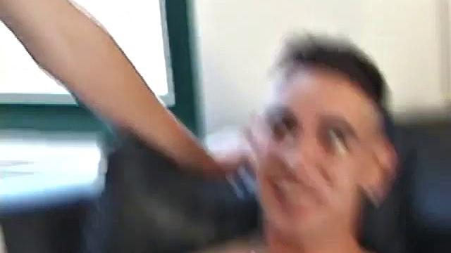 Christian and Richie sit on the sofa, watching a porn video while slowly rubbing their crotches. Richie shyly takes out his dick and watches as Christian strips off his shorts and exposes an impressive cock.