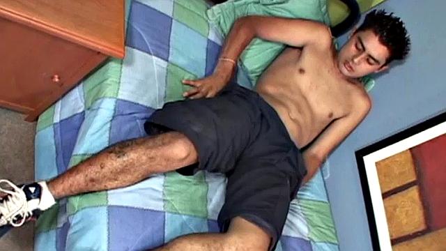 We join Latin twink Antonio, on his back and working up a stiff one. With his pants off, and shirt pulled up, he lets his hard cock poke out of the waist band of his underwear. Then the horny boy gets totally naked and starts stroking with determination.