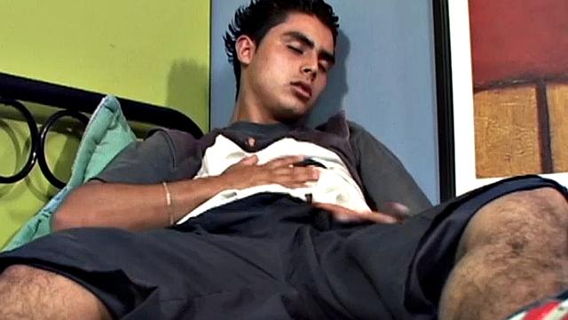 We join Latin twink Antonio, on his back and working up a stiff one. With his pants off, and shirt pulled up, he lets his hard cock poke out of the waist band of his underwear. Then the horny boy gets totally naked and starts stroking with determination.