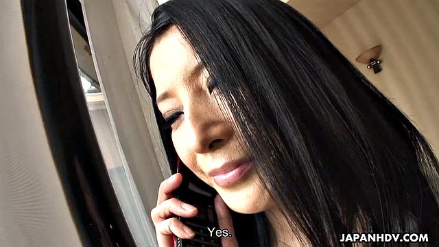 Dark haired Asian sucks a big pecker