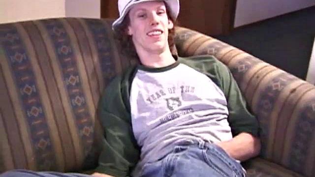 RJ Davis is a 21 year old Texas native who wants to show the world what unique talents he has to offer. Lying naked on the sofa, he starts to rub his cock before getting down with a purple dildo, which he loves.