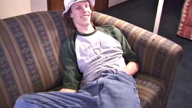 RJ Davis is a 21 year old Texas native who wants to show the world what unique talents he has to offer. Lying naked on the sofa, he starts to rub his cock before getting down with a purple dildo, which he loves.