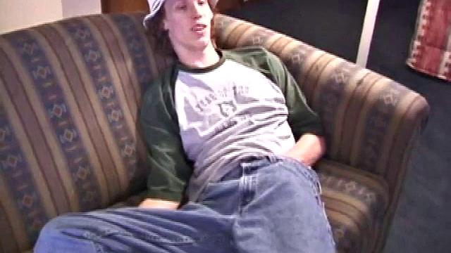 RJ Davis is a 21 year old Texas native who wants to show the world what unique talents he has to offer. Lying naked on the sofa, he starts to rub his cock before getting down with a purple dildo, which he loves.