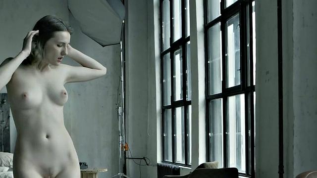 Erotic solo babe with natural boobs posing for men