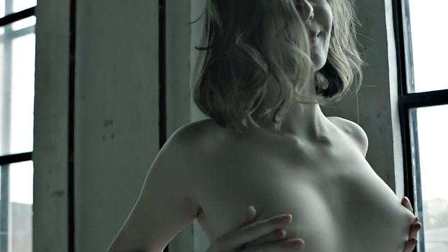 Erotic solo babe with natural boobs posing for men