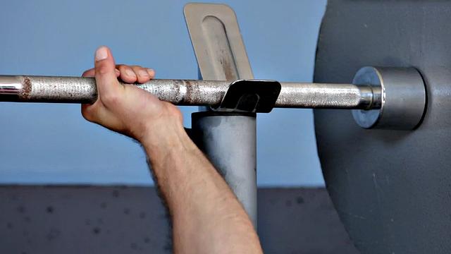 Hunky newbie solo tugging in gym until jizz