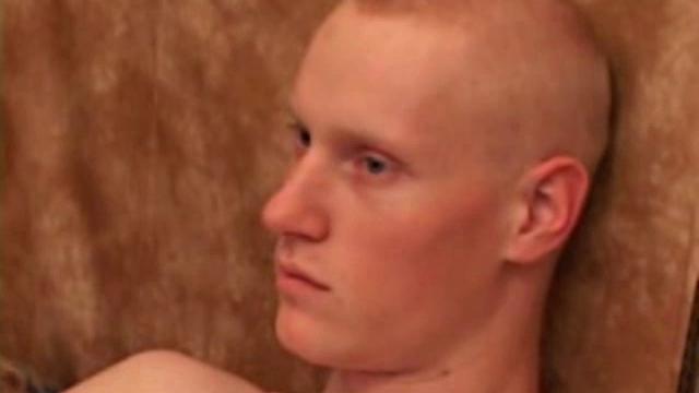 After stripping naked, Kaos gets himself hard and starts fingering his hole. In no time he pulls out a gigantic rubber dildo and lube it, but gets cold feet and settles for something smaller.