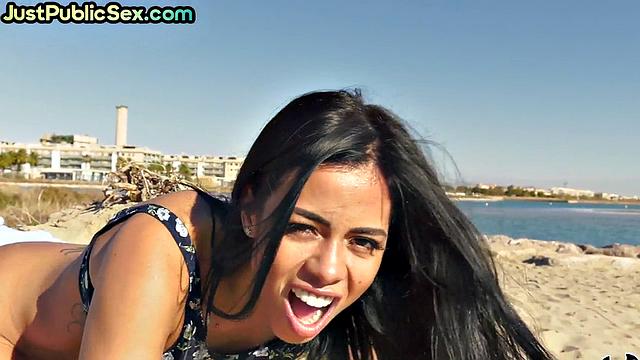 Analloving latina drilled at beach