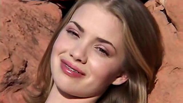 Watch April Loves playing with her bald pussy in the great outdoors