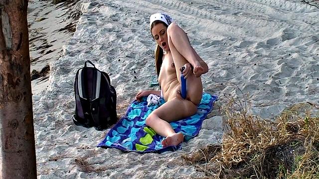 Ashlyn Lee goes fishing, but she enjoys a masturbation session on the sand. She