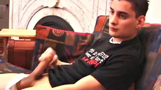 Travis Martinez starts out on the sofa to strip naked and get his dick boned up. Then he is all over the place, as he strokes hard and makes his big balls bounce. Eventually the horny young man blows his load.