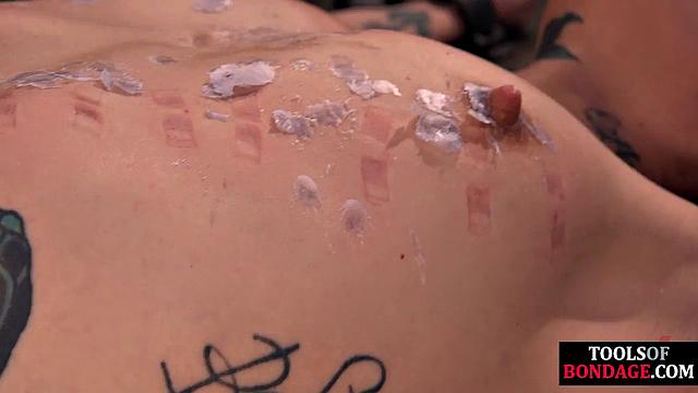 Bonded dungeon bitch fucked by pole