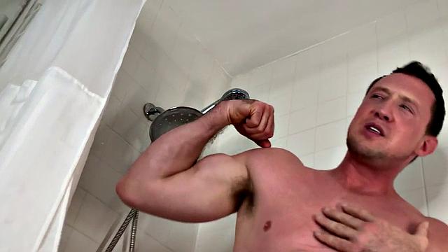 Handsome solo stud closeup jerks cock in bathtub until cum