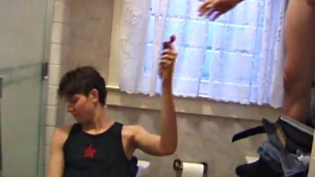 Dan Doe and Jayden have a little bet. Dan claims he can stand on the bathroom counter and shoot his load over onto the shower doors, 5 feet away. $10 is on the table and then $20. Jayden sits on the toilet and plays with himself.