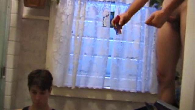 Dan Doe and Jayden have a little bet. Dan claims he can stand on the bathroom counter and shoot his load over onto the shower doors, 5 feet away. $10 is on the table and then $20. Jayden sits on the toilet and plays with himself.