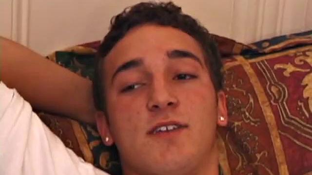 Race Banner has that sexy bad boy look that so many enjoy. He's stretched out on the bed, watching a porn video and rubbing his rapidly growing cock. His shirt comes off and he slides a hand inside his pants to pull at the stiff dick inside.