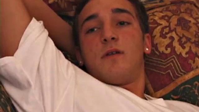 Race Banner has that sexy bad boy look that so many enjoy. He's stretched out on the bed, watching a porn video and rubbing his rapidly growing cock. His shirt comes off and he slides a hand inside his pants to pull at the stiff dick inside.