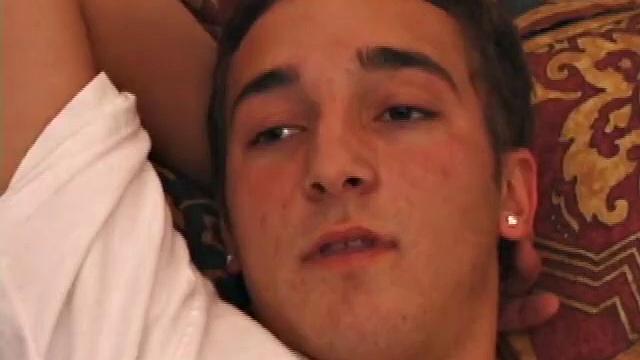 Race Banner has that sexy bad boy look that so many enjoy. He's stretched out on the bed, watching a porn video and rubbing his rapidly growing cock. His shirt comes off and he slides a hand inside his pants to pull at the stiff dick inside.