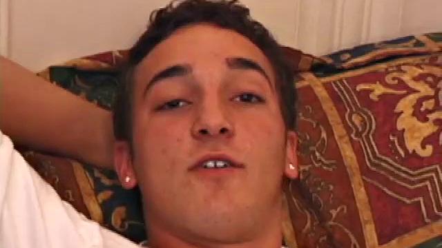 Race Banner has that sexy bad boy look that so many enjoy. He's stretched out on the bed, watching a porn video and rubbing his rapidly growing cock. His shirt comes off and he slides a hand inside his pants to pull at the stiff dick inside.