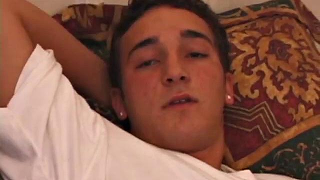 Race Banner has that sexy bad boy look that so many enjoy. He's stretched out on the bed, watching a porn video and rubbing his rapidly growing cock. His shirt comes off and he slides a hand inside his pants to pull at the stiff dick inside.