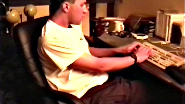 We look in on Brandon seated at the computer, as he pushes his pants down just enough to release his junk. By the time this hairy young man is stiff, the shirt is removed and he's jerking off. Once totally naked, Brandon strokes with determination.