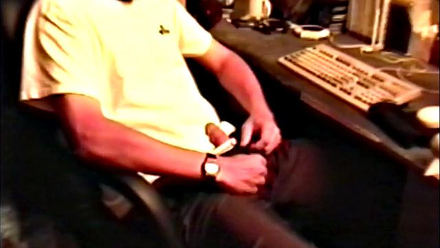 We look in on Brandon seated at the computer, as he pushes his pants down just enough to release his junk. By the time this hairy young man is stiff, the shirt is removed and he's jerking off. Once totally naked, Brandon strokes with determination.