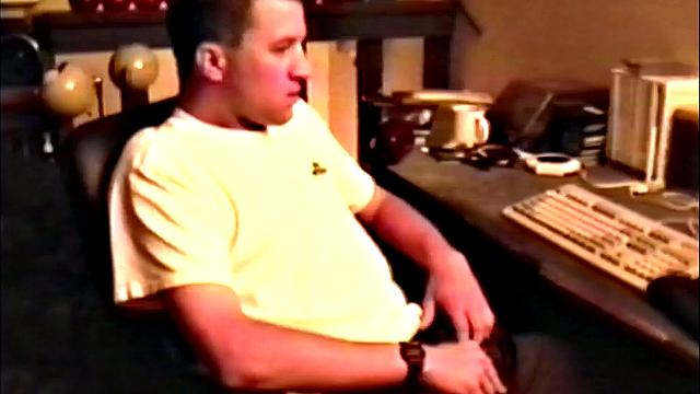 We look in on Brandon seated at the computer, as he pushes his pants down just enough to release his junk. By the time this hairy young man is stiff, the shirt is removed and he's jerking off. Once totally naked, Brandon strokes with determination.