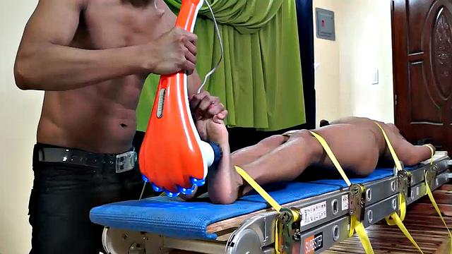 I absolutely love this sexy ticklish Asian boy Gilbert. He is delightfully ticklish, and his boy feet are to die for. We have him strapped down on the Laughing Asians tickle rack for straight boy Willy to have his way with.