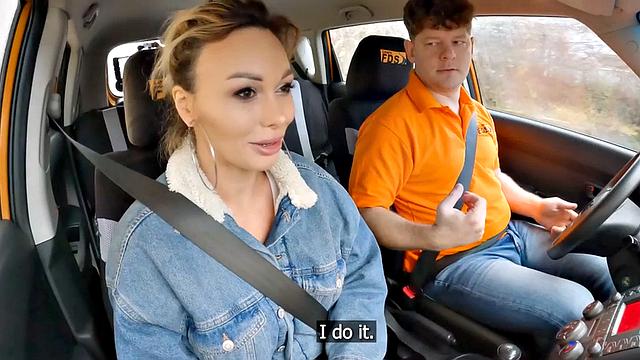 Driving amateur babe fucked by instructor outdoors in car