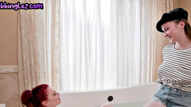 Lesbian love playing with hairy pussy in bath