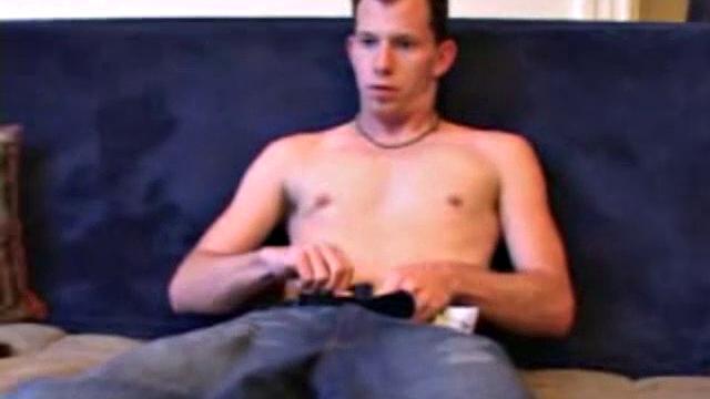 As a porn video plays, Raven strips naked and strokes his popping dick. He explodes an amazing cum load onto his chest.