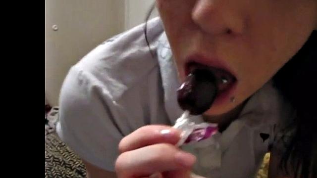 Riley Rebel Licking Lollipop in Bathtub