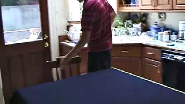 Always horny red haired skater Tristian covers the kitchen table with a large blue towel, stretches out a tape measure the length of the table, pulls out a porn magazine, tugs off his shirt, and gts down to business.