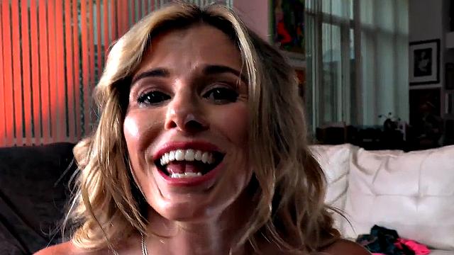 Busty POV MILF jerks oiled cock while talking dirty