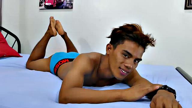 Rizal and his Asian boy feet are perfect in every way. Lean body, cute face, and big dick. Rizal teases you and shows off his perfection by stripping naked and rubbing his cock head on his smooth soles.