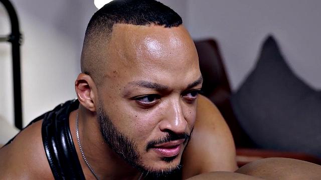 Mesmerized Black stud spanked and by dom hunk