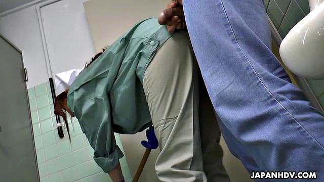 Maki Koizumi works as a cleaning staff and fucks a man in a public toilet