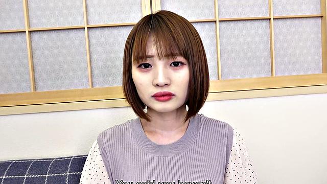 Japanese cafe worker Yuika Takigawa uses a sex toy to play.