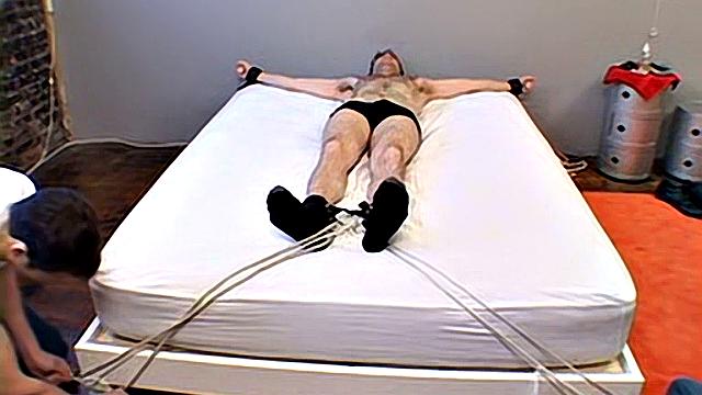 Trent strips down and strokes his hard cock for the camera