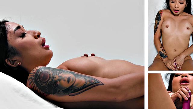 Inked babe solo fingering herself after interview