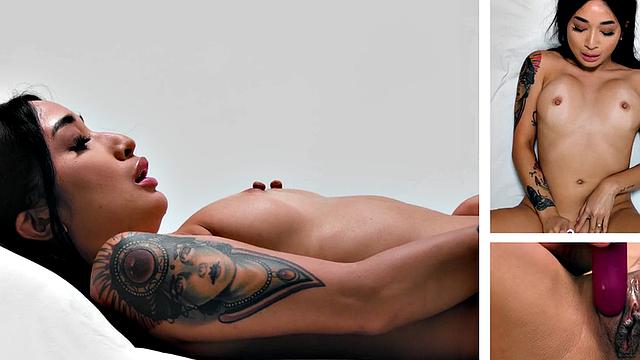 Inked babe solo fingering herself after interview