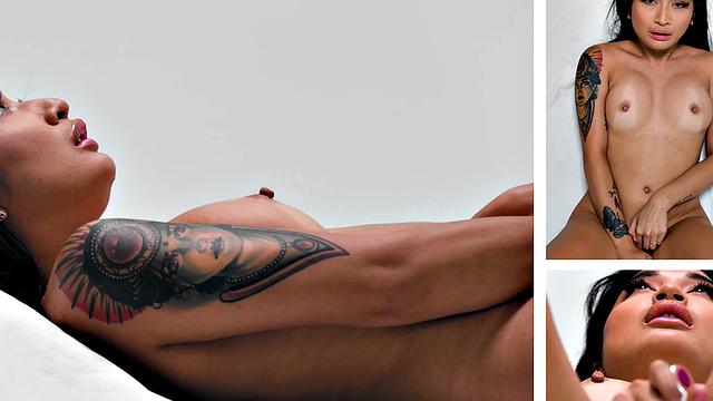 Inked babe solo fingering herself after interview