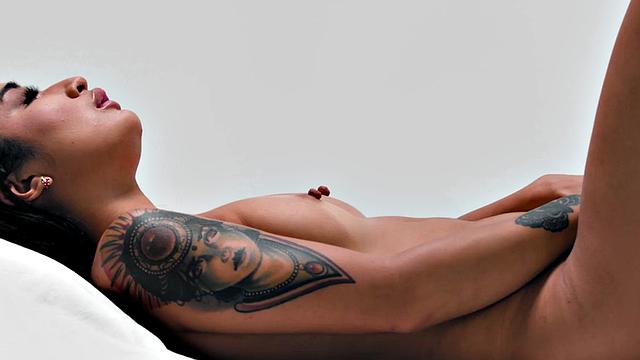 Inked babe solo fingering herself after interview