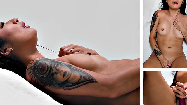 Inked babe solo fingering herself after interview